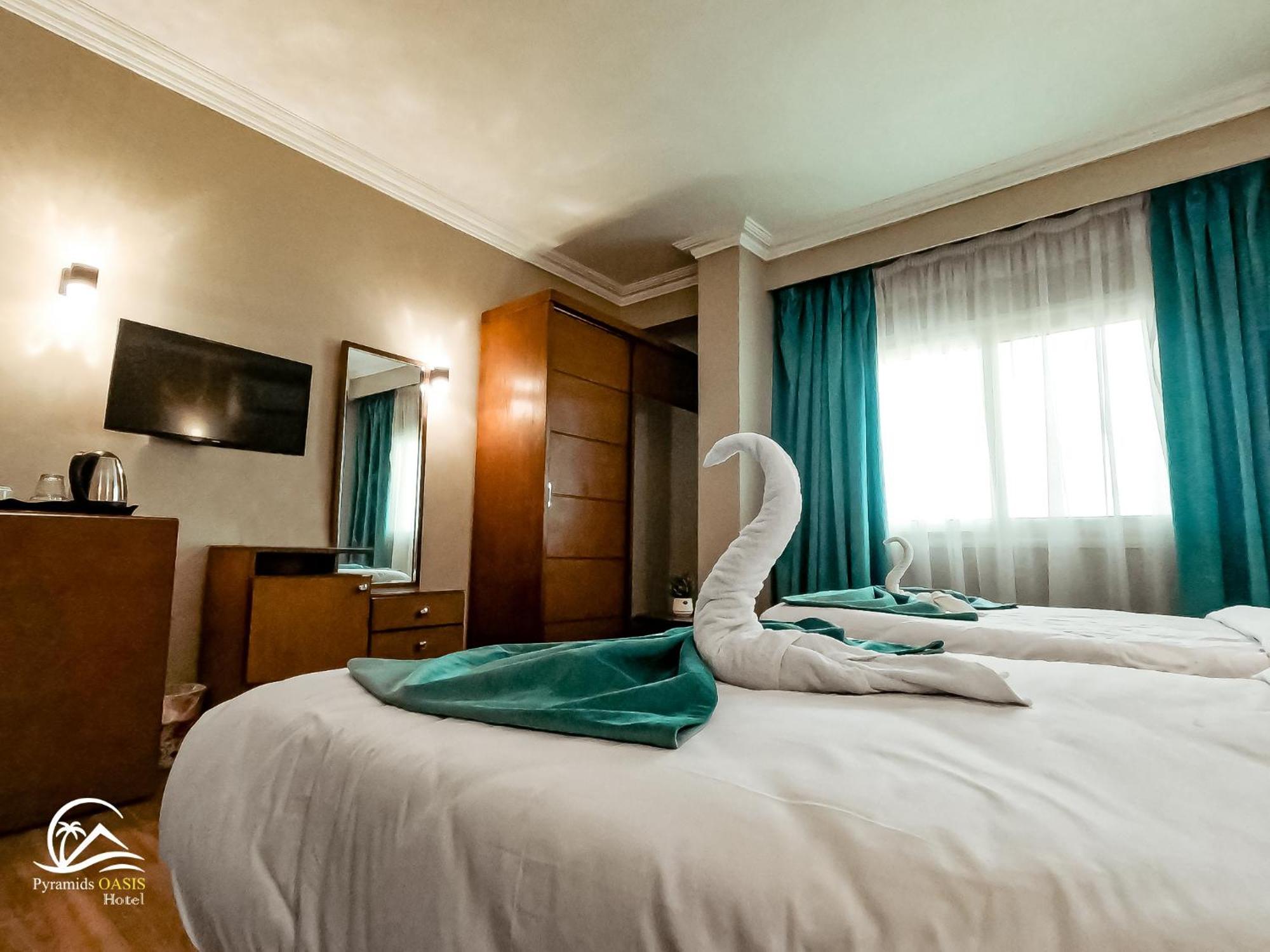 Pyramids Oasis Hotel Kafret el-Gabal Extérieur photo