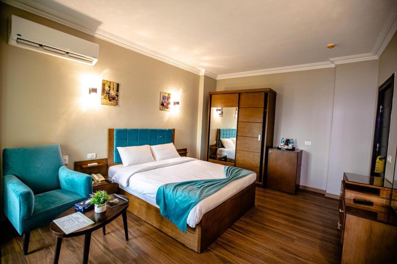 Pyramids Oasis Hotel Kafret el-Gabal Extérieur photo